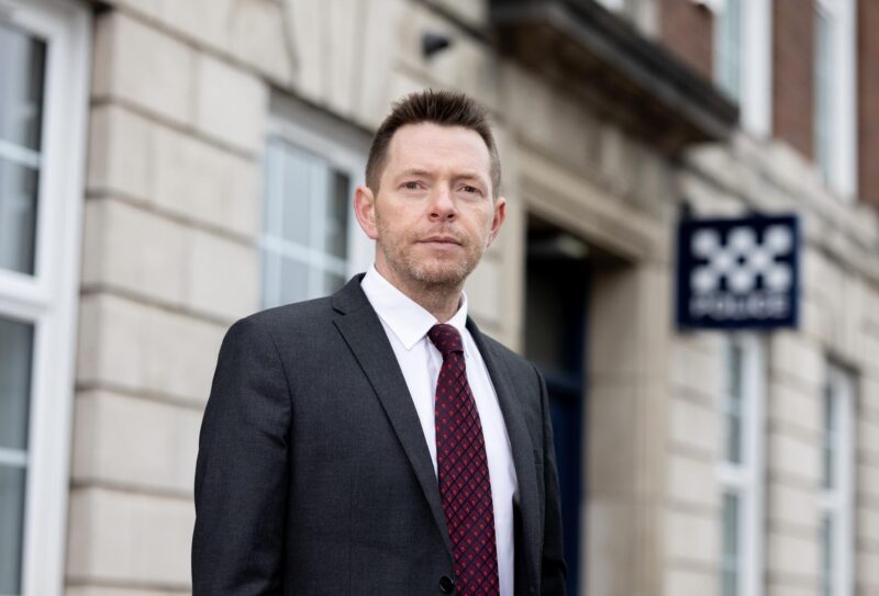 David stands outside Burslem Police Station